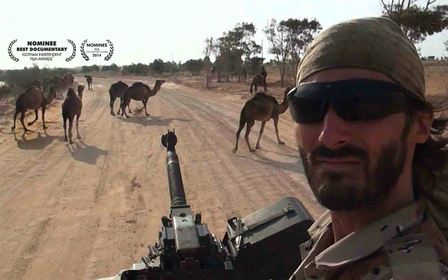 Matt VanDyke in Libya with camels